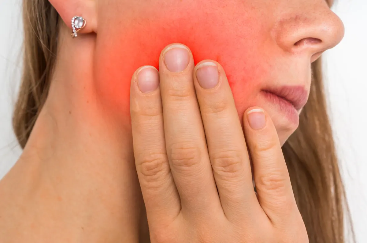 sun-park-dental patient experiencing jaw pain and discomfort caused by dental issues in Rocklin, California.