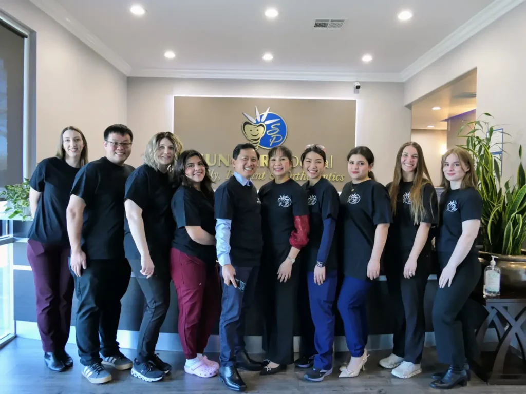 Sun Park Dental team standing together at the dental office in Rocklin CA